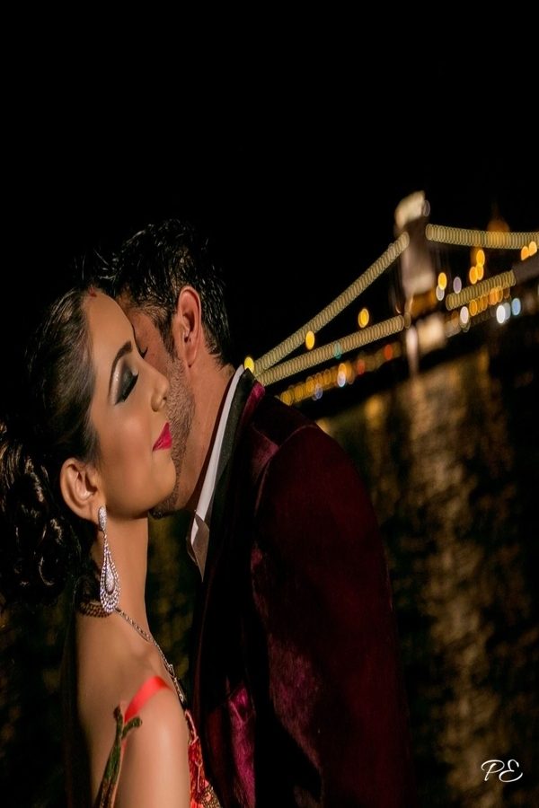 Wedding Party With Chain Bridge in Background